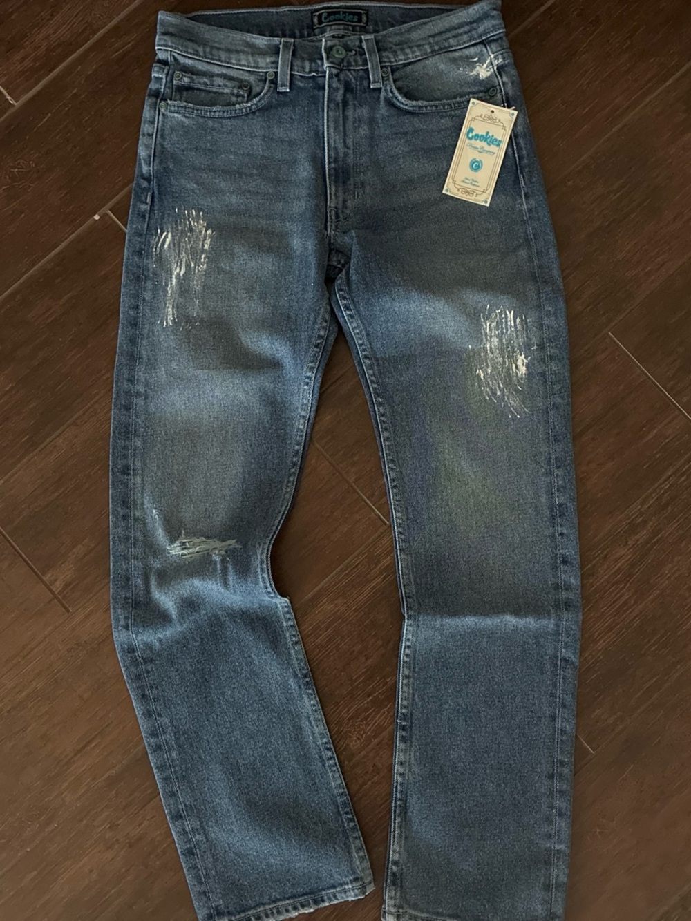 Brand new with tags. Cookies SF Distressed/Painted Men's Blue Jeans.‎ 28” x 32”